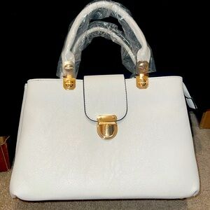 BNWT and dust bag White purse !